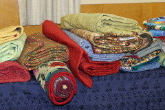 lots-of-quilts-and-a-couple-of-rugs_5716216917_o