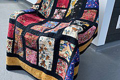 vicki-a-much-loved-and-well-used-lap-quilt-on-vickis-balcony_51350480076_o