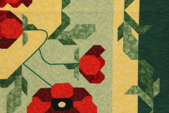 detail-of-isabels-poppy-quilt_17153124197_o
