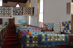 as-the-quilts-are-done-they-are-placed-in-the-sanctuary-of-the-church-for-all-the-see_12153975485_o
