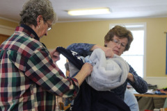 diane-and-lois-turning-a-quilt_12153975165_o