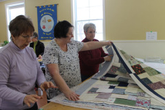 shirley-lynn-donna-prepare-the-layers-for-another-quilt_12154831326_o