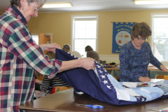 the-birthing-of-a-quilt-next-strp-is-topstitching-the-edge-then-the-tying_12154236923_o