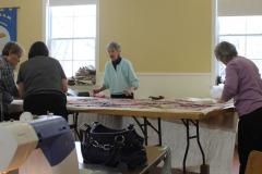 cutting-the-batting-to-fit-the-quilles_24209502773_o