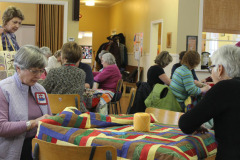 hand-tying-the-quilts_24744000951_o