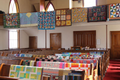a-few-of-the-finished-quilts-in-the-church_39985492735_o