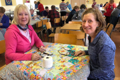 two-sharons-tying-a-cuddle-quilt_40534406613_o