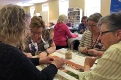 tying-a-quilt_46776761354_o