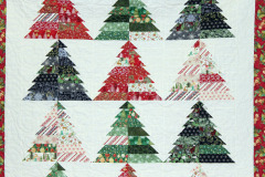 detail-of-micheles-tle-christmas-pattern-by-oda-may-moda-bakeshop-quilted-by-lynn-jones_25068647558_o