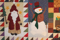 detail-of-terrys-hand-appliqued-christmas-quilt_23295476841_o