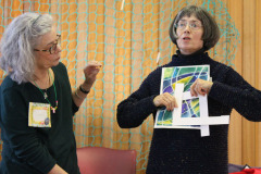 linda-deciding-which-part-of-the-watercolour-she-will-make-into-a-finished-fabric-piece_32212045516_o