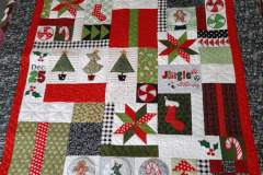 jingle-all-the-way-pieced-and-embroidered-by-nadine-ss-85-yr-old-mom-machine-custom-quilted-by-nadine_50799977031_o