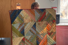 Throw quilt by Kellie S.