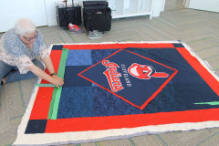 gail-and-her-quilt-for-her-garnison_42149476251_o