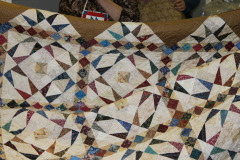 judy-mck-scrappy-quilt-quilted-by-tlc-quilting-studio_49029227976_o