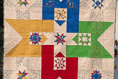 rose-star-machine-pieced-and-machine-quilted_51351174394_o