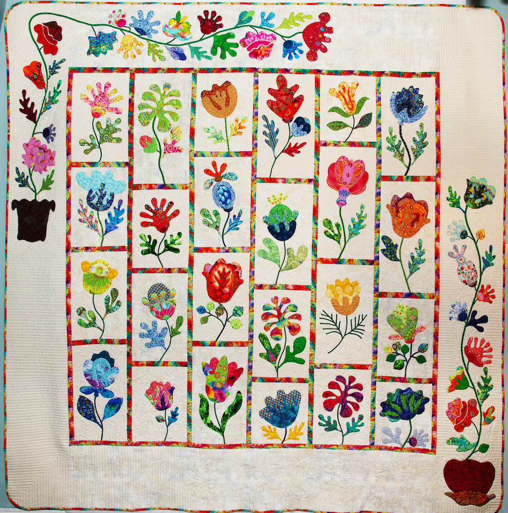 2024 Raffle Quilt by Krista Garber, quilted by Pam Wells.
